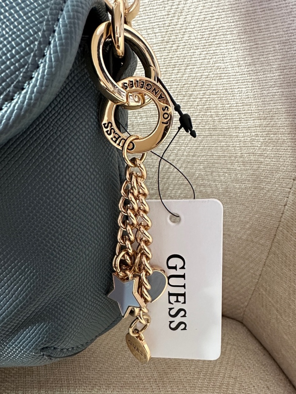 Guess Dark Denim Color Crossbody Saddle Bag with Gold Hardware - Picture 2 of 10